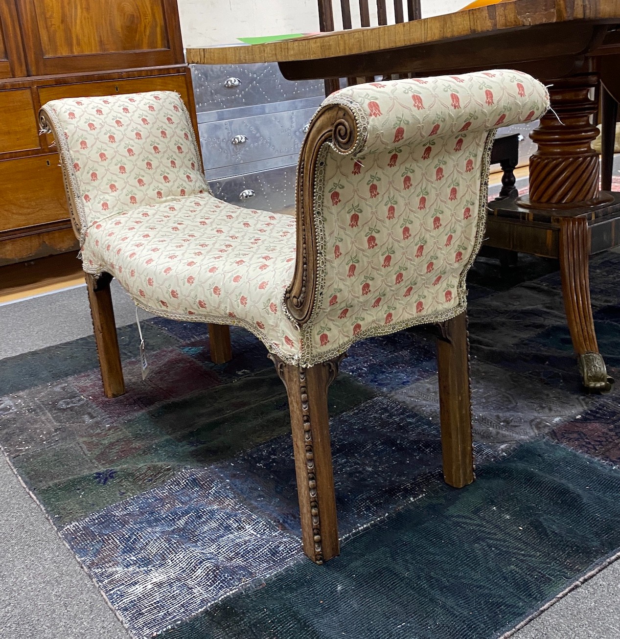 A George III mahogany framed serpentine window seat, c.1780, width 110cm, height 66cm